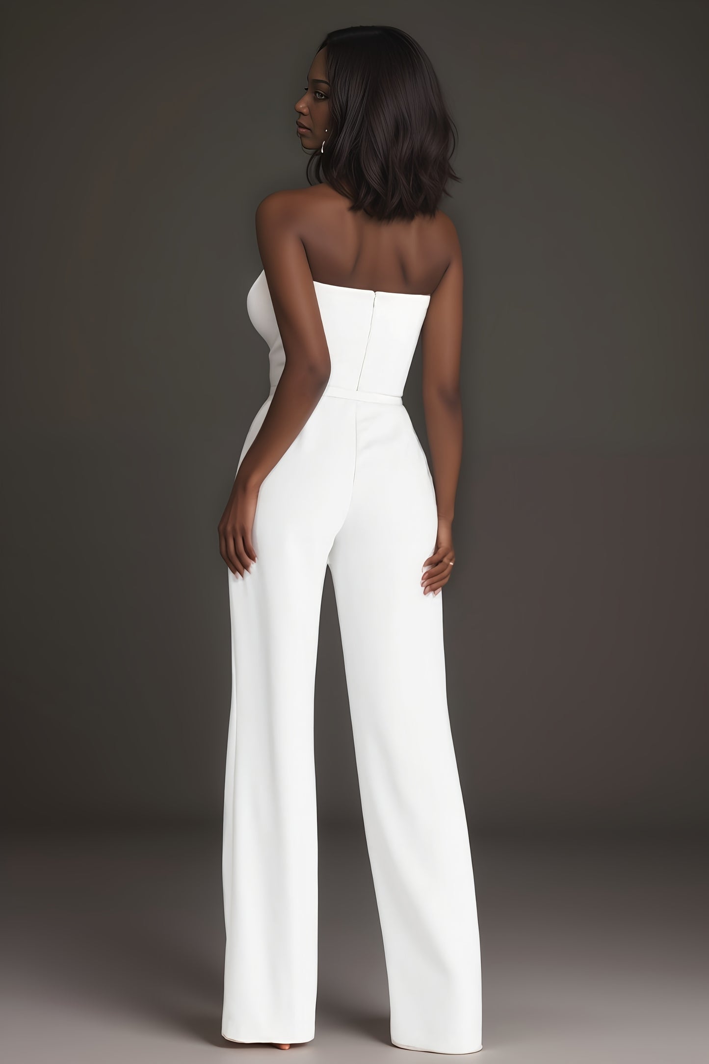 Elegant white jumpsuit with a sheer pearl-embellished bodice and wide-leg pants