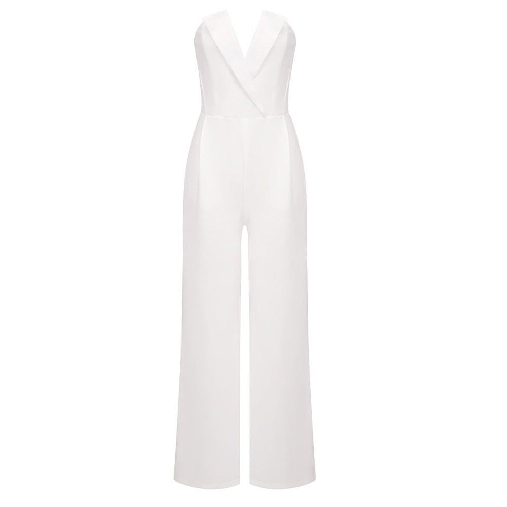 Elegant white jumpsuit with a sheer pearl-embellished bodice and wide-leg pants